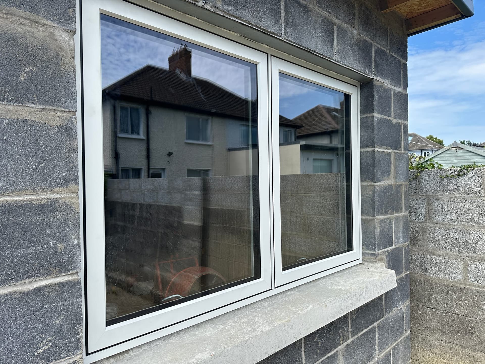 New white casement window replacing an older unit on a Dublin home by MDM Windows & Doors
